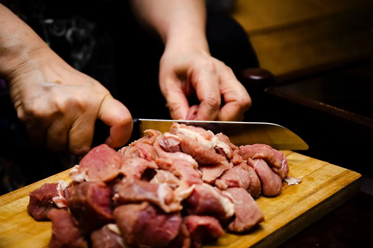 A picture containing person, indoor, food, boardDescription automatically generated