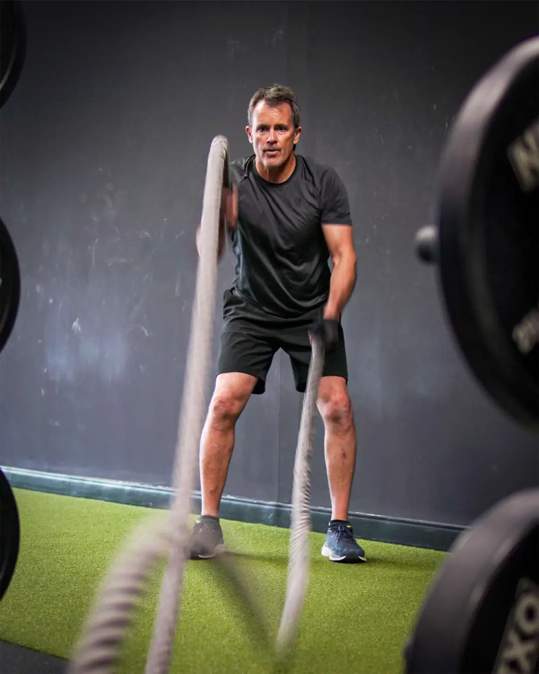 Upper body strength training - battle ropes workout at Galaxy Fit Lab Naples for enhanced cardio and arm strength